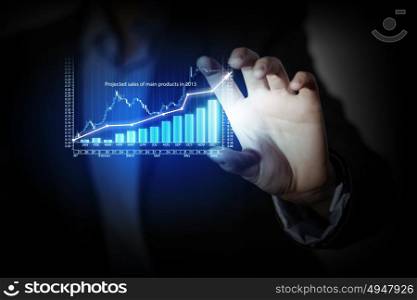 Growth concept. Close up of businesswoman hand presenting digital charts