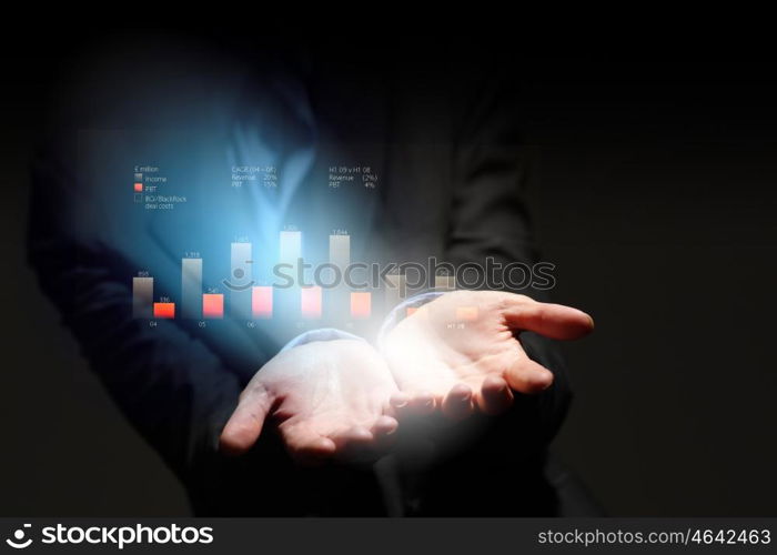 Growth concept. Close up of businesswoman holding graphs in hand