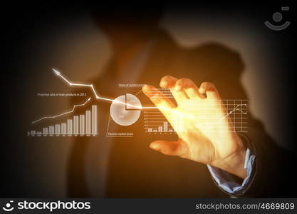 Growth concept. Close up of businesswoman holding graphs in hand