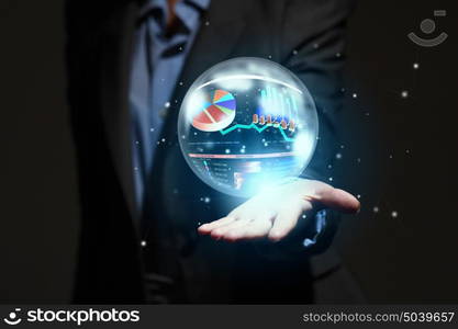 Growth concept. Close up of businesswoman holding graphs in hand