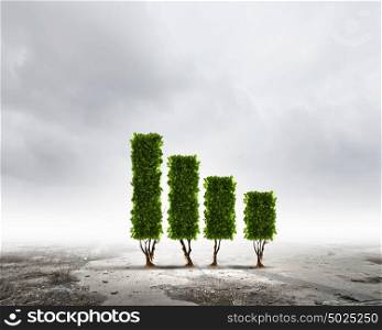 Growth concept. Image of green plant shaped like graph