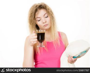 Grumpy tired woman holding black coffee about to drink. Hard morning, getting energy.. Tired woman drinking her morning coffee