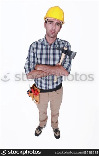 Grumpy tradesman holding a hatchet