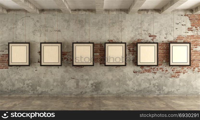 Grunge art gallery. Grunge art gallery with frames hanging with ropes - 3d rendering