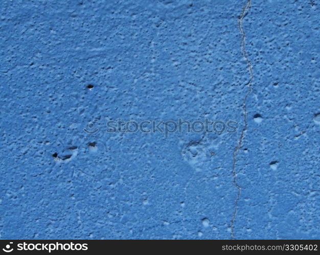 grunge background of an old blue wall