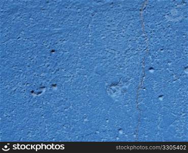 grunge background of an old blue wall