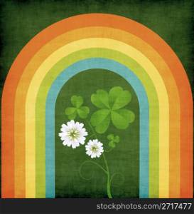 Grunge background with four leaves clover and rainbow