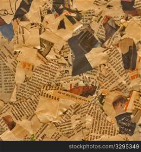 Grunge Background with torn newspaper