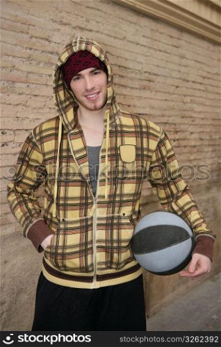 grunge basket ball street player on brickwall with cup