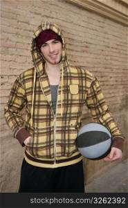 grunge basket ball street player on brickwall with cup
