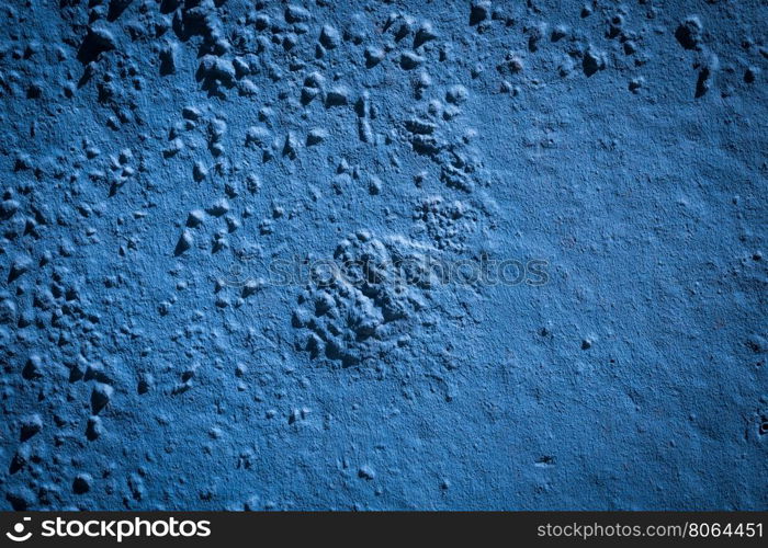 Grunge blue painted wall for texture background