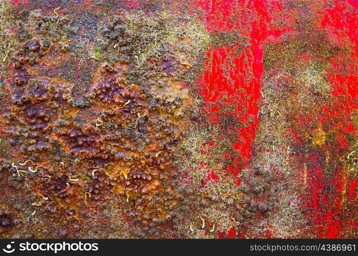 Grunge boat hull background in red and rusty colorful texture