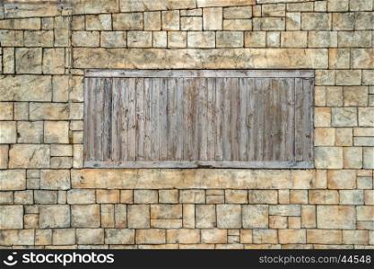 grunge brick wall with wooden window using as background