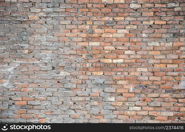 Grunge construction brick wall as background