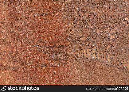 Grunge corroded rusty weathered iron surface closeup as background