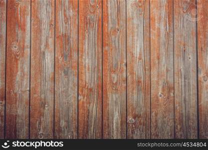 Grunge red planks with texture and peeling paint