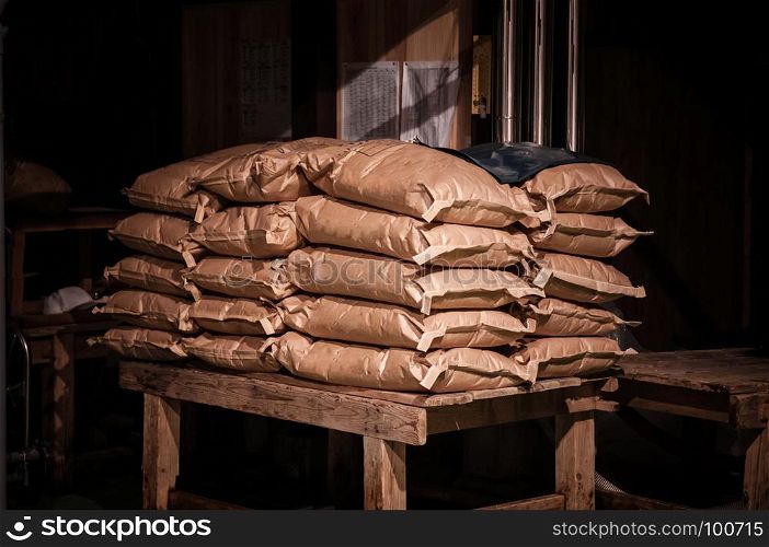 Grunge shot of Japanese rice sack old barn with dark and low key light
