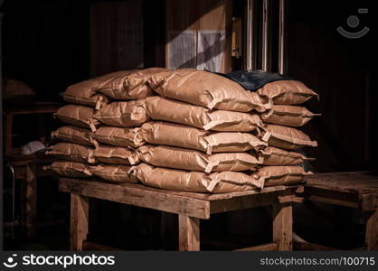 Grunge shot of Japanese rice sack old barn with dark and low key light