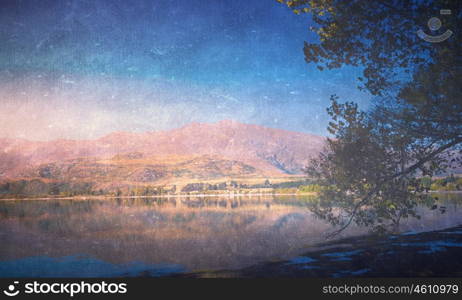 Grunge styled lanscape. Natural beautiful landscape of mountain lake and forest