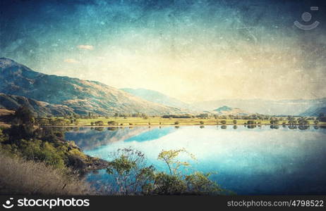 Grunge styled lanscape. Natural beautiful landscape of mountain lake and forest