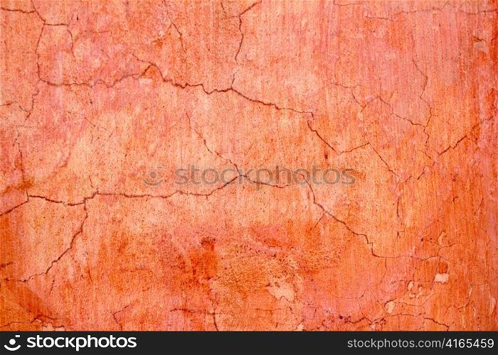 grunge wall cracked texture in orange red colors