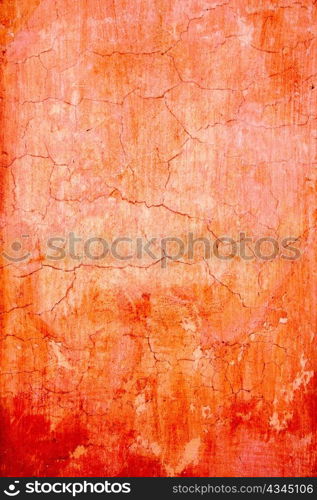 grunge wall cracked texture in orange red colors