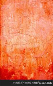 grunge wall cracked texture in orange red colors