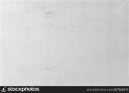 Grunge White Concrete Wall Background. Grungy white concrete wall background. Background from high detailed fragment stone wall. Cement texture. Grey concrete wall.