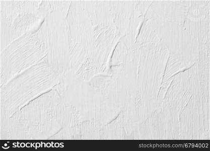 Grunge White Concrete Wall Background. The grunge white concrete old texture wall.