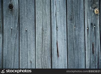 Grunge wooden background of old gray unpainted boards