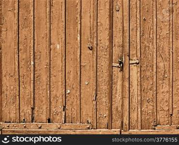 grungy brown doors background of painted wood plank or wooden old aged texture