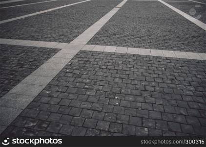 Grungy but stylish and cozy paving stone in perspective. Classical European architecture street design