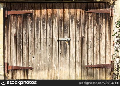 grungy old brown barn doors with natural wood plank, background