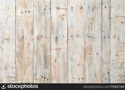 Grungy white paintwork on a wooden panel