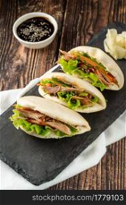 Gua bao, steamed buns with meat and vegetable. Asian cuisine