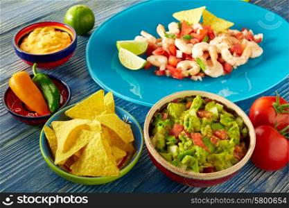 Guacamole mexican food with shrimp ceviche nachos and chili peppers