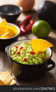 guacamole with avocado, lime, chili and tortilla chips