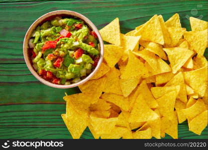 Guacamole with avocado tomatoes and nachos mexican food