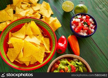 Guacamole with avocado tomatoes and nachos mexican food