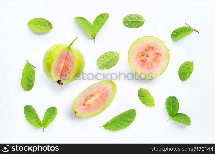 Guava with leaves on white background.
