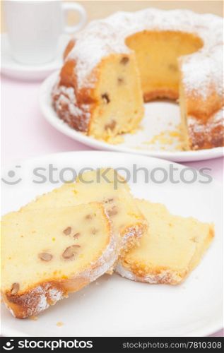 Gugelhupf - Slices of Traditional Gugelhupf Sponge Cake with Raisins and Walnuts