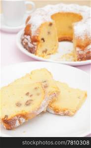 Gugelhupf - Slices of Traditional Gugelhupf Sponge Cake with Raisins and Walnuts
