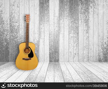 Guitar in old empty wood room background