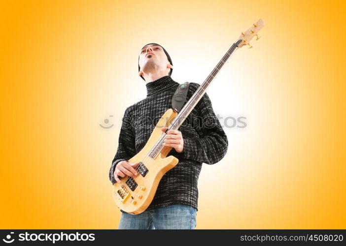 Guitar player isolated on the white background