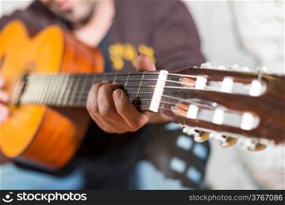 Guitarist playing his guitar on the street