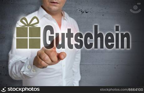 Gutschein (in german Voucher) is shown by man concept.. Gutschein (in german Voucher) is shown by man concept