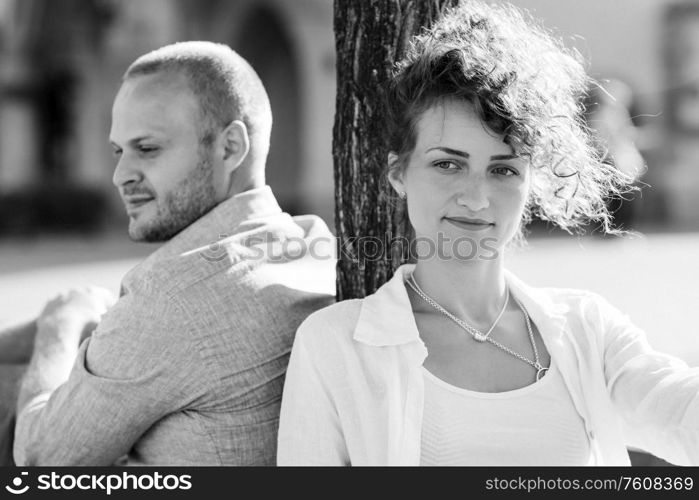 guy and a girl happily walk in the morning on the empty streets of old Europe