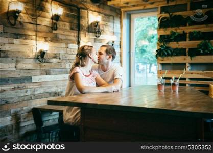 guy and a girl meeting in a city stylized cafe