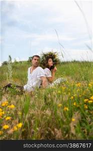 guy and girl on the meadow