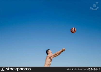 guy hitting volleyball